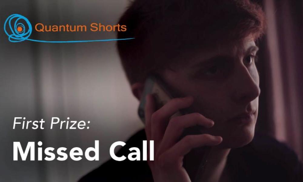 Video still image of the "Missed Call" video which won the first prize in the Quantum Shorts 2023 competition. Image shows a young white man holding a phone to his ear.